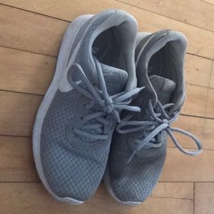 Gray Nike running shoes